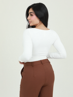 BODY MANGA LARGA HEBILLA CONCHA