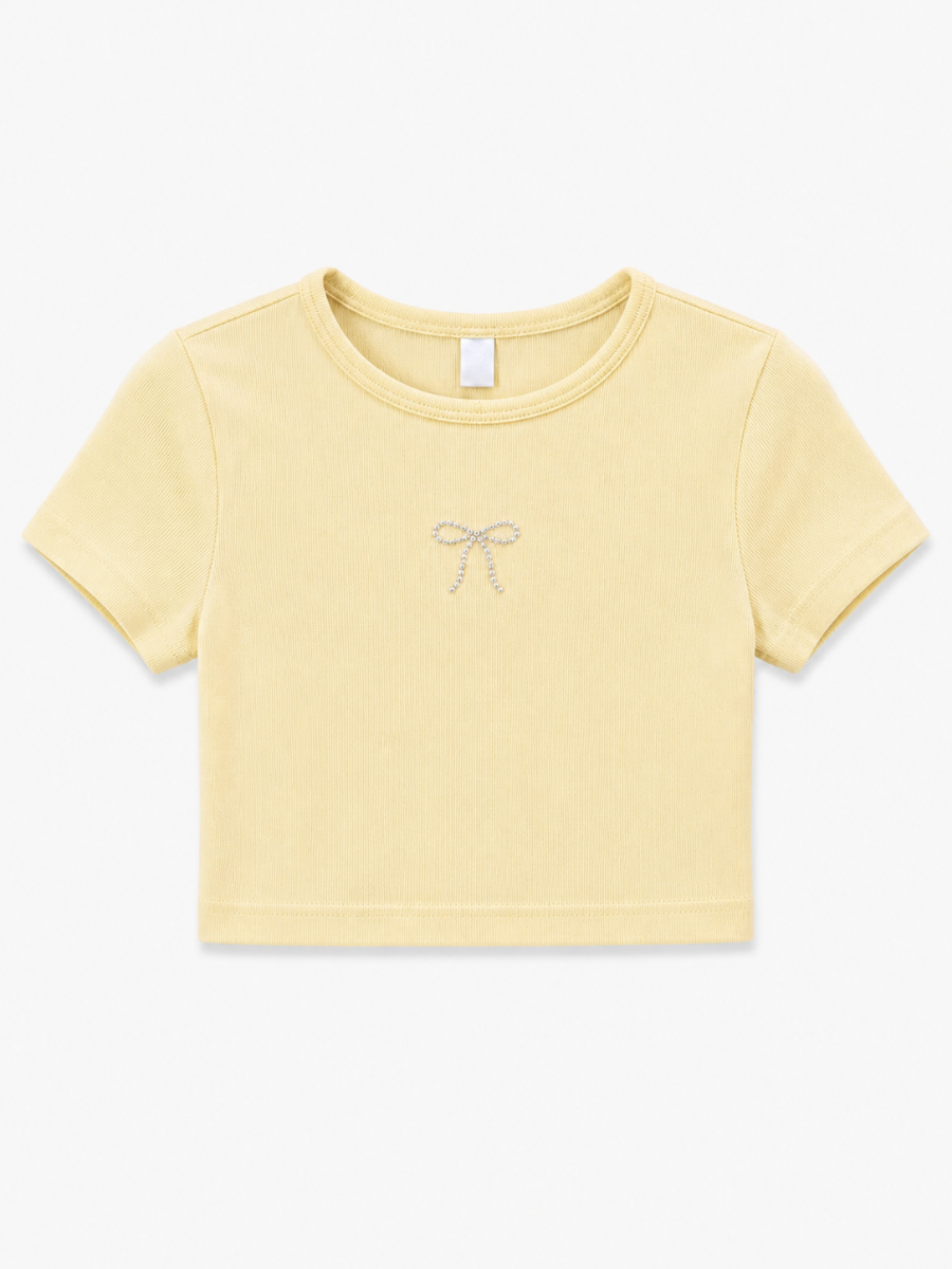 BLUSA CORTA MOÑO PIEDRAS