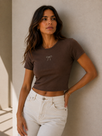 BLUSA CORTA MOÑO PIEDRAS